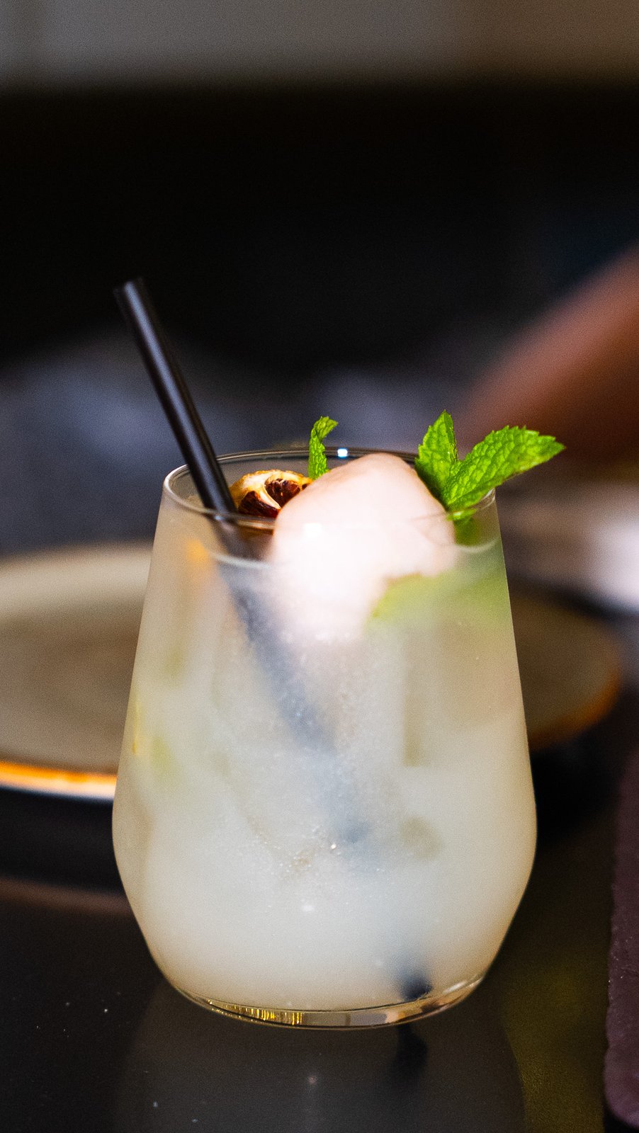 Cocktail garnished with mint at a NYC restaurant client
